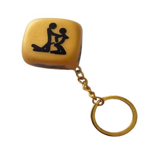 LLAVERO DADO DORADO POSTURAS